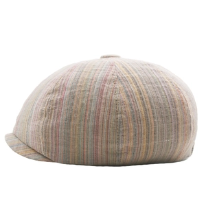 Detail view of cotton linen newsboy hat showing multi-colored thin stripes and textured fabric