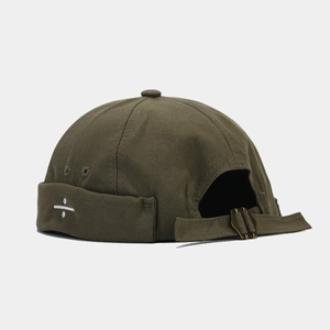 Detail view of military green miki hat featuring white division symbol embroidery