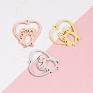 Mirror polished heart pendants with kissing couple silhouette in rose gold, gold, and silver