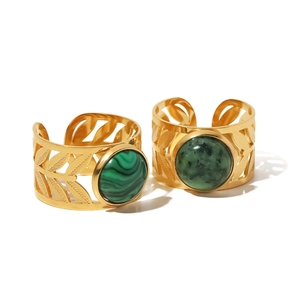 18K gold-plated stainless steel rings with hollow leaf patterns and green stones