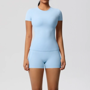 Light blue two-piece yoga set with short sleeve slim fit t-shirt and matching sports shorts