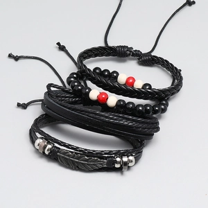 Retro 4-piece woven leather bracelet set with feather pendant and colorful beads