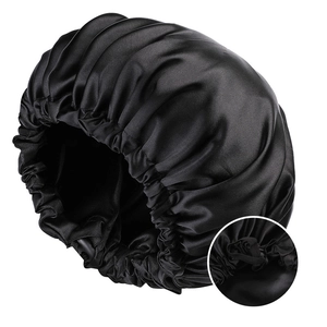 Adjustable black satin sleep cap for women featuring dual-layer fabric and sizing buckle