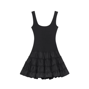 Sleeveless black mini dress with ribbed knit top and layered satin tiered skirt
