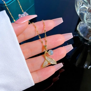 Titanium steel fishtail necklace with gold plating, zircon inlay, and mermaid bead pendant