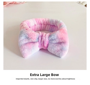 Detail of gradient pink and blue tie-dye plush headband with wide elastic band