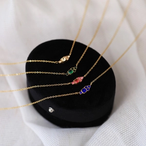 Gold plated stainless steel necklaces with colorful zircon stones in four elegant shades