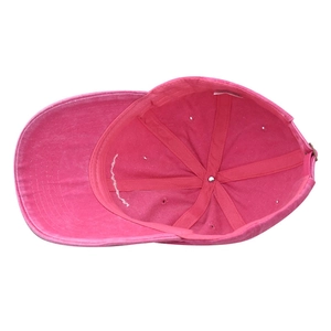 Internal view of rose red washed cotton baseball cap with six-panel structure and metal buckle