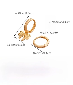 Detailed size specifications for gold copper bow earrings and cubic zirconia hoop set
