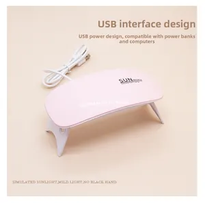Detail of compact SUNmini UV LED nail lamp with USB interface and foldable stand