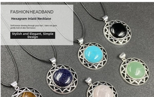 Macro detail of hexagram crystal pendants featuring natural obsidian and tiger eye stones