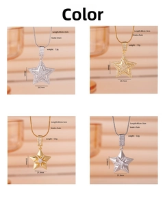 Macro detail of gold and silver star pendant necklaces with snake chains and paved zircons