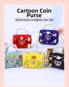 Macro detail of mini jelly handbags with heart buckles, pearl handles and cute charms