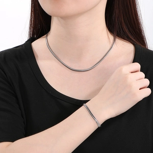 Sleek silver stainless steel flat snake chain necklace and bracelet jewelry set for unisex