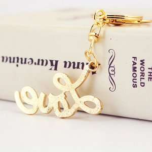 Elegant golden metal Love letter keychain with rhinestones for bags and car keys