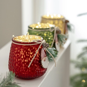 Christmas glass candle holder jars with LED string lights and festive pine cone ornaments