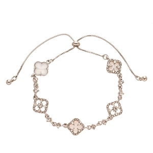 Adjustable silver clover flower bracelet with sparkling pavé crystals and white shells