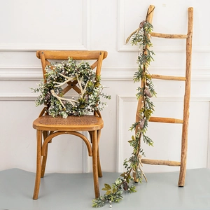 Christmas wreath and garland set with eucalyptus leaves, pine cones, and white berries