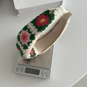 Weight measurement of 40.9g for this colorful handmade crochet flower headband