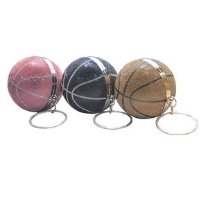 Sparkling basketball rhinestone evening bags in pink, black, and gold colors with ring handles