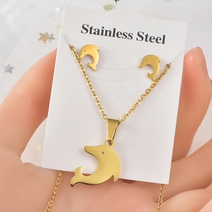 Golden stainless steel jewelry set featuring dolphin pendant necklace and stud earrings