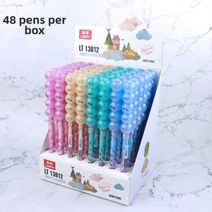 Macro detail of stacking bullet pencils in candy shape with colorful cartoon designs