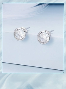 Macro view of S925 sterling silver stud earrings with round brilliant-cut cubic zirconia