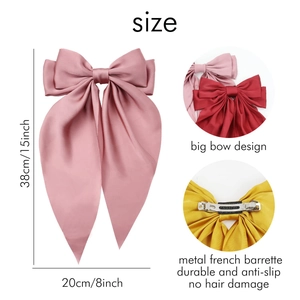 Detailed view of oversized satin bow hair clip with dimensions and French barrette back