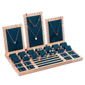 Green velvet and wood jewelry display set for necklaces, rings and bracelets