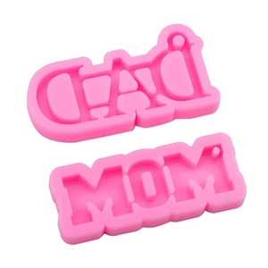 Pink silicone DIY resin mold featuring DAD and MOM letter designs for creative crafts
