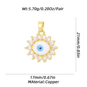 Detail view of evil eye charm with gold plating and zircon inlay including dimensions