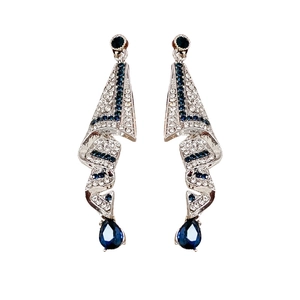 Silver satin drop earrings with blue crystal accents and elegant geometric design