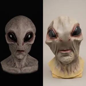 Detailed comparison of realistic alien latex mask showing skin texture and black eyes