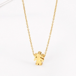 Detailed close-up of a golden silhouette girl pendant on a fine polished chain
