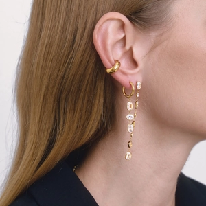 18K gold plated tassel earrings with geometric colorful zircon crystals on a model