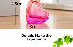 Macro detail of a 4.5cm pink gradient heart-shaped glass bottle with dimensions