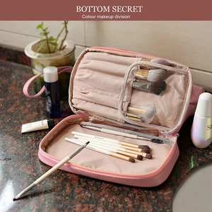 Rosa wasserdichte Make-up-Pinseltasche mit Fächern und transparenter Staubschutzhülle