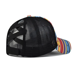 Detail of cross elastic ponytail hole and black breathable mesh on baseball cap