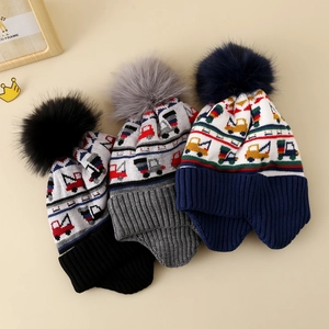 Winter knit hats for kids with excavator patterns, faux fur pompom, and warm ear flaps