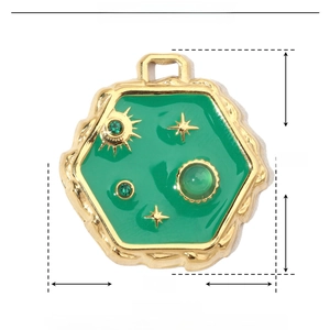Macro view of green enamel hexagonal pendant with gold border and rhinestone detail