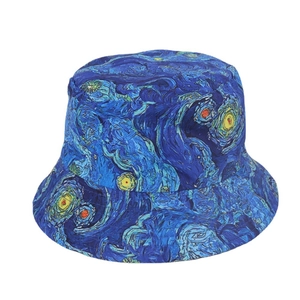Detailed close-up of blue Van Gogh Starry Night print on cotton kids bucket hat