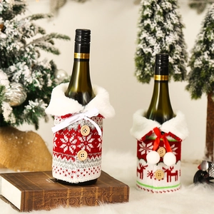 Detailed knit Christmas wine bottle cover with faux fur collar and decorative wooden buttons