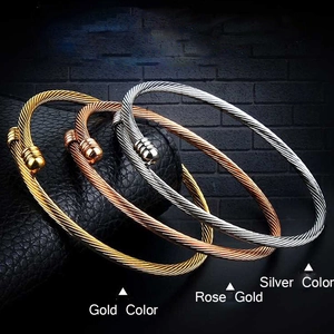 Minimalist titanium steel cable bracelets in gold, rose gold and silver finishes