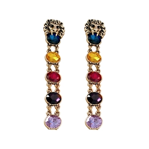 Vintage golden lion head earrings with colorful multi-gemstone tassels on white background