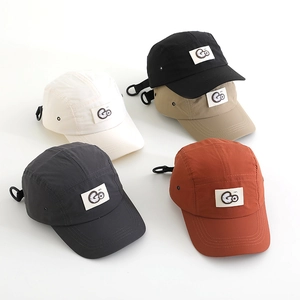 Flat lay of five color varieties for the outdoor quick-dry camper cap with Go logo