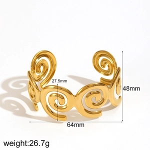 Detailed view of gold spiral cuff bracelet with precise diameter and width measurements