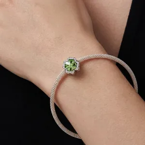 Classic S925 sterling silver mesh bracelet with a green four-leaf clover charm and crystals