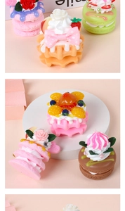 Detailed view of assorted miniature resin dessert charms featuring waffles and macarons