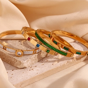 Stack of 18K gold plated stainless steel bead bracelets with multi-color zircon stones