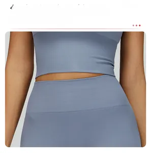 Detail view of high waist yoga pants showing ribbed texture and tummy control fit